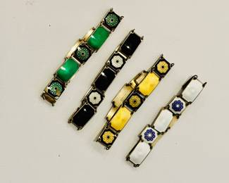 Four sterling silver and enamel David Andersen (Norway) guilloche modernist bracelets (green, black, yellow, and white)