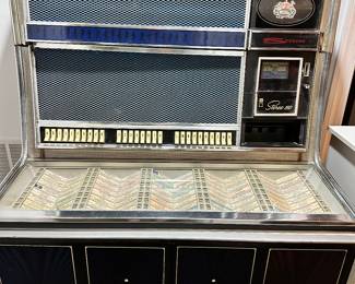 Vintage Jukebox. Working.  Includes all music