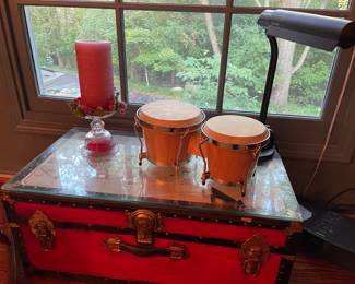 Storage chest, desk lamp, candle and drums