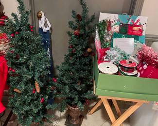 Lit trees, ribbon and bags