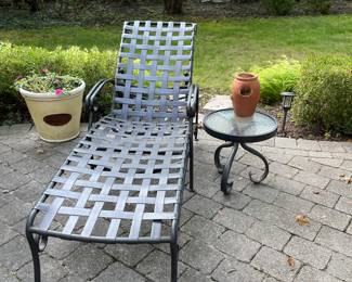 Chaise lounger and side table; planters
