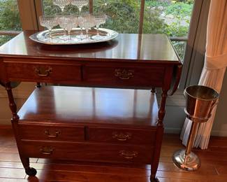 Bar/coffee cart with drawers; champagne glasses and floor wine/champagne cooler