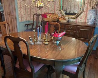 Dining room table with 2 leaf extensions, 4 side chairs and 2 armchairs; matching sideboard also available
