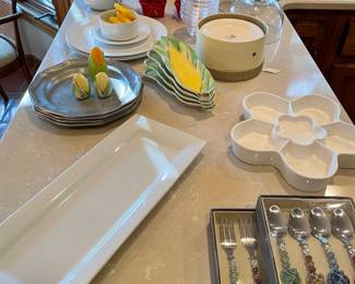 pewter plates, appetizer forks and spoons, plates and corn holders