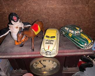 Vintage Tin Toys Marx Dick Tracy, Learn To Drive. Also Tin Toy donkey and penguin 
