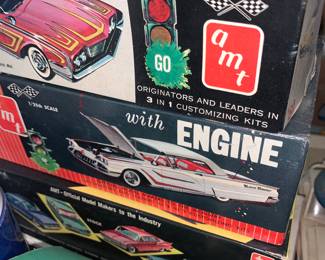 Vintage AMT model cars with engines. All have been put together or mostly put together. 