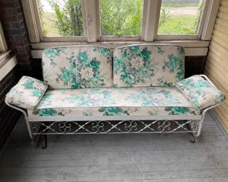 Vintage Glider Couch folds down to a cot - could use recovering