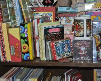 Large collection of Mary Engelbreit items including tins, books, cards, magazines, prints, notebooks, calendars, decorating books, note cards, greeting cards, booklets, and more!