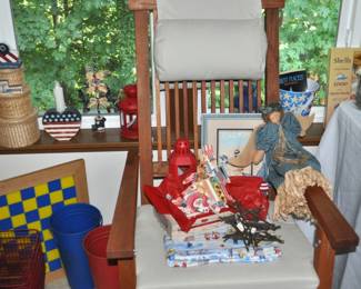 Game board, nesting baskets, Ikea teak? deck chairs (2) w/pads, beach decor, decorative candle lanterns, red and blue pails.