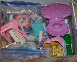 Lots of vintage toys upstairs and downstairs!  Barbie furnishings, Barbies, Buddy L 1970s, Care Bears, Fisher-Price, Hot Wheels, Kenner Sea Wees, Knight Rider belt, Mantech, Matchbox, My Little Ponies, My Little Sea Ponies, Popeye suspenders, Remco, Strawberry Shortcake, Strawberry Shortcake belt, Woody Woodpecker suspenders, and more.