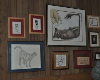 Collection of framed prints.