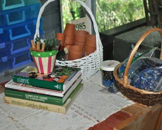Gardening books, terra cotta pots, vase marbles, just a sampling of all the garden items!