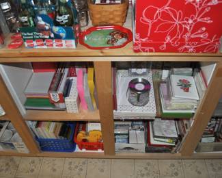 Art supplies, hundreds of greeting cards, brushes, buttons, calligraphy supplies, colored pencils, fabric, Gingher scissors, lace and trims, multi-drawer cases and cabinets, needlepoint kits, notions, paints oil and acrylic, pastels, pattern books, plasterware, ribbon, Scrapbook Companion case, scrapbook supply drawer cabinets, scrapbooking materials (tons!), note pads (lots and lots), notebooks, paper supplies, pens/pencils, stationery and stationery supplies, envelopes, folders, tons of office supplies.