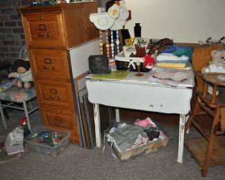 Four-drawer oak file cabinet, white chippy dropleaf table, vintage convertible high chairs, lots of vintage toys upstairs and downstairs!  Barbie furnishings, Barbies, Buddy L 1970s, Care Bears, Fisher-Price, Hot Wheels, Kenner Sea Wees, Knight Rider belt, Mantech, Matchbox, My Little Ponies, My Little Sea Ponies, Popeye suspenders, Remco, Strawberry Shortcake, Strawberry Shortcake belt, Woody Woodpecker suspenders, doll buggy, and more.