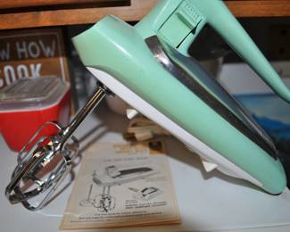 Kitchen:  Corningware, Laguna Melmac dishes, linens, Pyrex nesting bowls, mint green 1968 hand mixer w/instruction booklet, barware, coffee makers, Corelle dinnerware, flatware, kitchen gadgets, Krups grinder, Oster blender, popcorn popper, pots and pans, Pyrex baking dishes, toaster, waffle iron, cobalt glass dinner set, Gense Ultima stainless steel, Oneida crystal, Orrefors crystal, Princess House, set of Snowman china, Sweden stainless steel serving pieces, cookbooks, huge selection of coffee mugs (many collectible and many in original boxes) including Starbucks, Laurel Burch, Deborah Mumm, tea kettles, knife set, milk glass, magnets, Rubbermaid, Ikea jars, rolling pins, baking items, paper goods, spices and seasonings, large griddle, canned goods, glassware, and more!