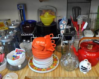 Kitchen:  Corningware, Laguna Melmac dishes, linens, Pyrex nesting bowls, mint green 1968 hand mixer w/instruction booklet, barware, coffee makers, Corelle dinnerware, flatware, kitchen gadgets, Krups grinder, Oster blender, popcorn popper, pots and pans, Pyrex baking dishes, toaster, waffle iron, cobalt glass dinner set, Gense Ultima stainless steel, Oneida crystal, Orrefors crystal, Princess House, set of Snowman china, Sweden stainless steel serving pieces, cookbooks, huge selection of coffee mugs (many collectible and many in original boxes) including Starbucks, Laurel Burch, Deborah Mumm, tea kettles, knife set, milk glass, magnets, Rubbermaid, Ikea jars, rolling pins, baking items, paper goods, spices and seasonings, large griddle, canned goods, glassware, and more!