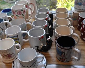 Kitchen:  Corningware, Laguna Melmac dishes, linens, Pyrex nesting bowls, mint green 1968 hand mixer w/instruction booklet, barware, coffee makers, Corelle dinnerware, flatware, kitchen gadgets, Krups grinder, Oster blender, popcorn popper, pots and pans, Pyrex baking dishes, toaster, waffle iron, cobalt glass dinner set, Gense Ultima stainless steel, Oneida crystal, Orrefors crystal, Princess House, set of Snowman china, Sweden stainless steel serving pieces, cookbooks, huge selection of coffee mugs (many collectible and many in original boxes) including Starbucks, Laurel Burch, Deborah Mumm, tea kettles, knife set, milk glass, magnets, Rubbermaid, Ikea jars, rolling pins, baking items, paper goods, spices and seasonings, large griddle, canned goods, glassware, and more!