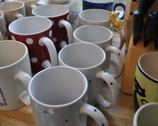 Kitchen:  Corningware, Laguna Melmac dishes, linens, Pyrex nesting bowls, mint green 1968 hand mixer w/instruction booklet, barware, coffee makers, Corelle dinnerware, flatware, kitchen gadgets, Krups grinder, Oster blender, popcorn popper, pots and pans, Pyrex baking dishes, toaster, waffle iron, cobalt glass dinner set, Gense Ultima stainless steel, Oneida crystal, Orrefors crystal, Princess House, set of Snowman china, Sweden stainless steel serving pieces, cookbooks, huge selection of coffee mugs (many collectible and many in original boxes) including Starbucks, Laurel Burch, Deborah Mumm, tea kettles, knife set, milk glass, magnets, Rubbermaid, Ikea jars, rolling pins, baking items, paper goods, spices and seasonings, large griddle, canned goods, glassware, and more!