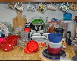 Kitchen:  Corningware, Laguna Melmac dishes, linens, Pyrex nesting bowls, mint green 1968 hand mixer w/instruction booklet, barware, coffee makers, Corelle dinnerware, flatware, kitchen gadgets, Krups grinder, Oster blender, popcorn popper, pots and pans, Pyrex baking dishes, toaster, waffle iron, cobalt glass dinner set, Gense Ultima stainless steel, Oneida crystal, Orrefors crystal, Princess House, set of Snowman china, Sweden stainless steel serving pieces, cookbooks, huge selection of coffee mugs (many collectible and many in original boxes) including Starbucks, Laurel Burch, Deborah Mumm, tea kettles, knife set, milk glass, magnets, Rubbermaid, Ikea jars, rolling pins, baking items, paper goods, spices and seasonings, large griddle, canned goods, glassware, and more!