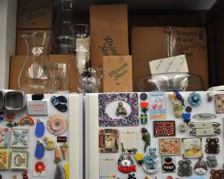 Kitchen:  Corningware, Laguna Melmac dishes, linens, Pyrex nesting bowls, mint green 1968 hand mixer w/instruction booklet, barware, coffee makers, Corelle dinnerware, flatware, kitchen gadgets, Krups grinder, Oster blender, popcorn popper, pots and pans, Pyrex baking dishes, toaster, waffle iron, cobalt glass dinner set, Gense Ultima stainless steel, Oneida crystal, Orrefors crystal, Princess House, set of Snowman china, Sweden stainless steel serving pieces, cookbooks, huge selection of coffee mugs (many collectible and many in original boxes) including Starbucks, Laurel Burch, Deborah Mumm, tea kettles, knife set, milk glass, magnets, Rubbermaid, Ikea jars, rolling pins, baking items, paper goods, spices and seasonings, large griddle, canned goods, glassware, and more!