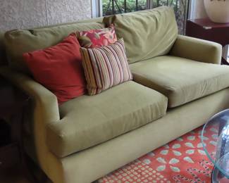 One of two matching loveseats and end tables.