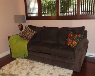Faux brown suede sleeper sofa.