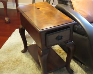 End table with storage and built in power for lamp and charging station.