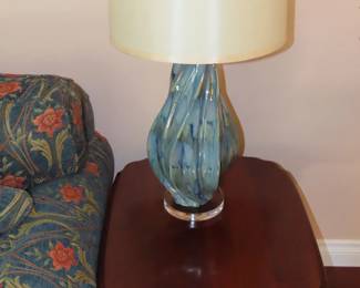 Two of two matching end tables and table lamps.