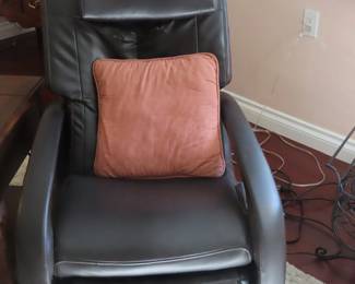 Black leather like Human Touch massage chair that is in perfect working order.