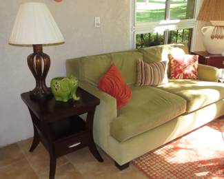 One of two matching loveseats and end tables.