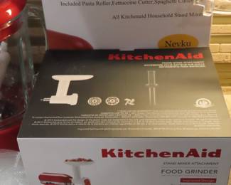 New in box KitchenAid Food Grinder attachment.