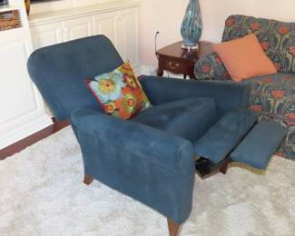 One of two blue fabric push back LaZBoy recliners.