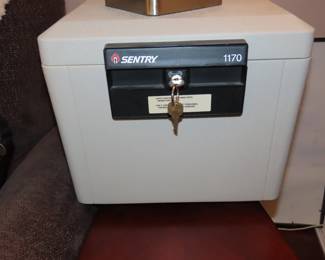 Sentry document fire box with key.