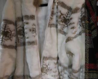 Like new L, XL, XXL ladies clothing some with tags.