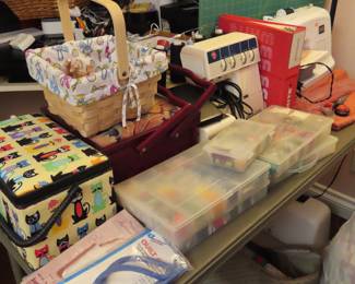 Sewing machines, sewing baskets, embroidery threads, quilting books, sewing notions.