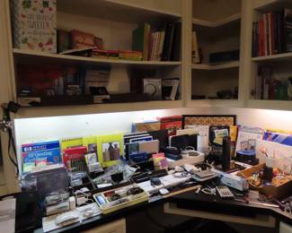 Office supplies, desk organizers, two Amazon Echos, Nook, iPad, Apple Magic keyboard. Apple chargers and leads. 