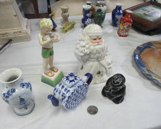 All types of collectibles, including Royal Doulton, Staffordshire, Royal Copenhagen, Intuit carving, and Russian porcelain