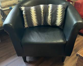 Pair of black faux leather chairs 