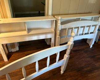 Pair of twin beds with headboards, footboards and wood side rails and slats