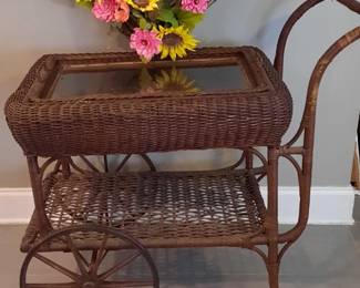 Antique wicker tea cart with removable tray.  Circa 1900