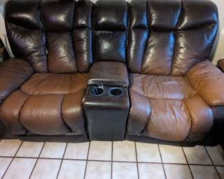 Leather loveseat with electric recliners 2 stage recline legs and head prices to  move off of estate site .First $150.00 takes it home .Here is the best part the loveseat has a twin .Just bigger the matching couch yes leather as well and a suit is for sale as well .First $200.00 cash takes it home as well.Folks that is 2 leather not pleather electric 2 stage reclining couch and loveseat for the lo low price of $350.00 don't expect  these prices to be overlooked and pieces to be here long !!! Estate opens 8 am !!!!!!