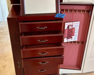 Powell Old English cherrywood jewelry armoire
18 x 15 x 40”h $145
