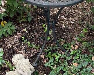 Concrete squirrels $40
Vintage Round wrought Iron Table $39 