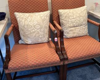 Set of two formal sitting chairs. Upholstered with nail head trim. Faded on backside but otherwise in great condition. 
