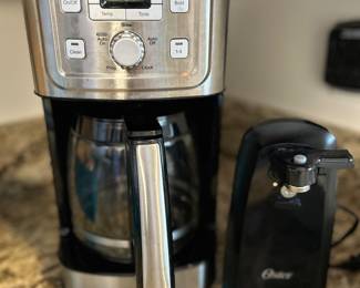 Fairly new coffee maker and new electric can opener.