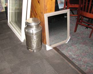 milk can and a mirror