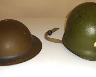 (LEFT) BRODIE MARK II HELMET, CAMO PAINT APPLIED. STAMPED C.L.C. 1942 , (RIGHT) KOREAN WAR HELMET "RANK - MAJOR" (SEE NEXT PIC)