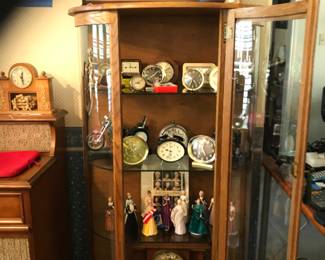 Collection of vintage and modern alarm clocks.