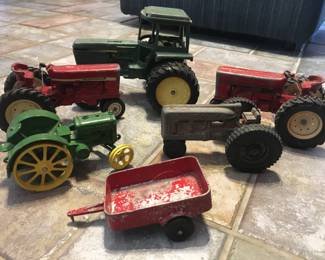 These are heavy duty vintage children’s tractors.