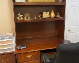 Tall computer desk
And a wooden filing cabinet